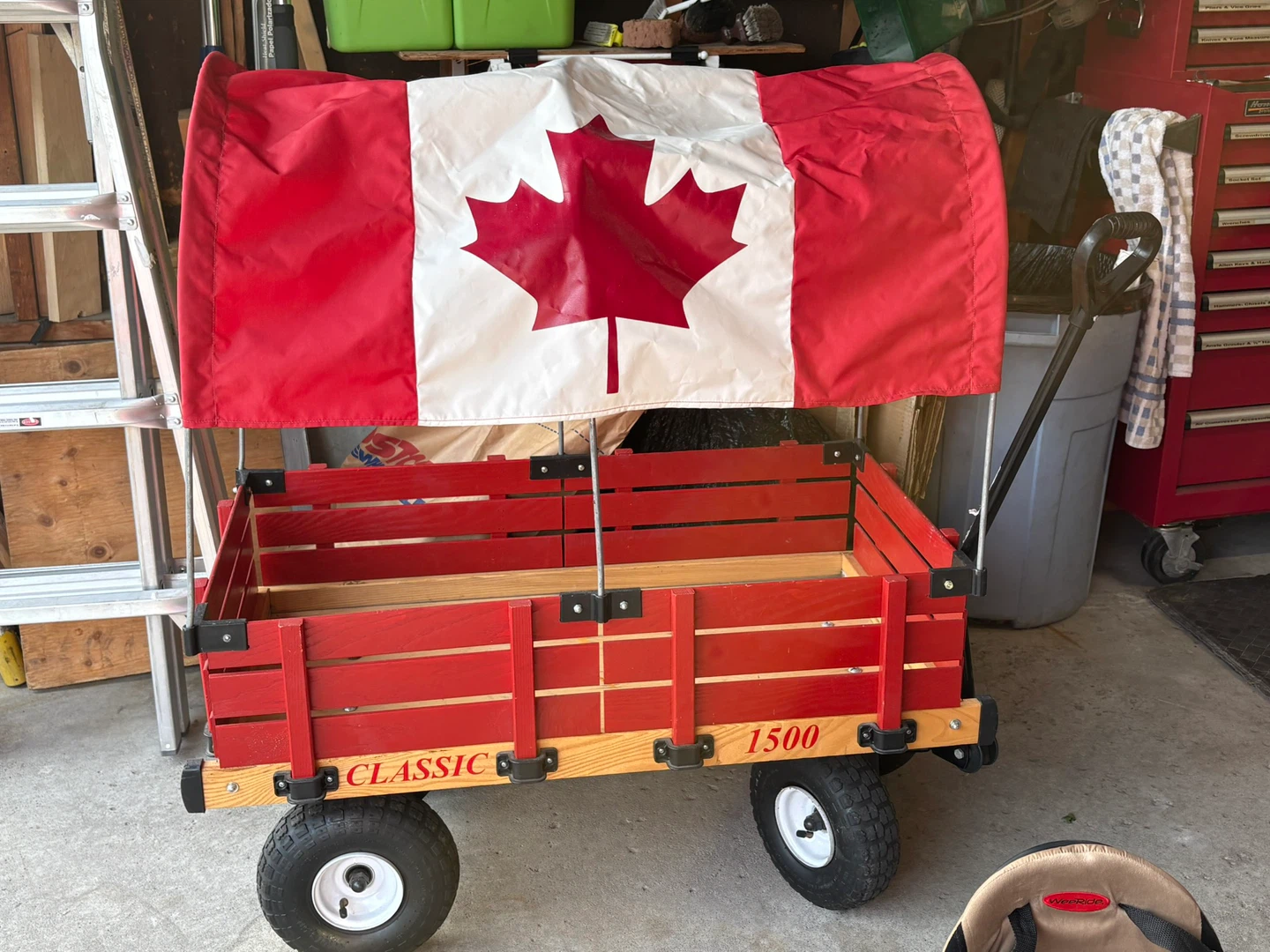 Classic Red Wagon with Canadian Flag Canopy