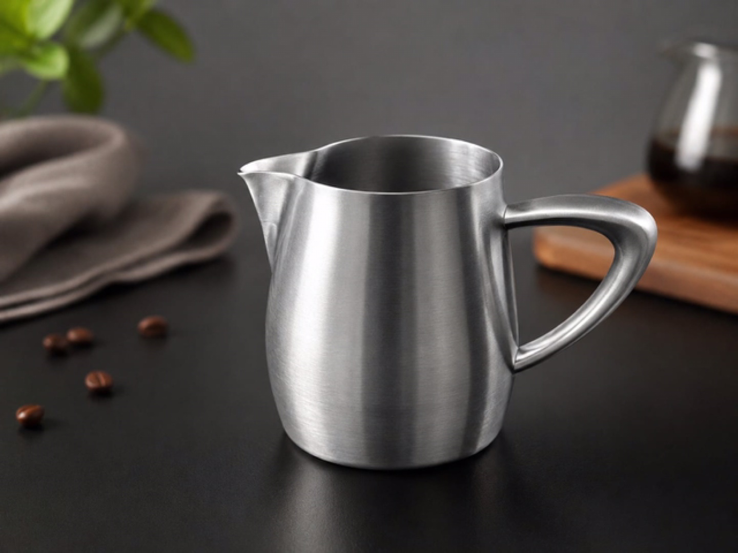 small size stainless steel milk frothing pitcher.