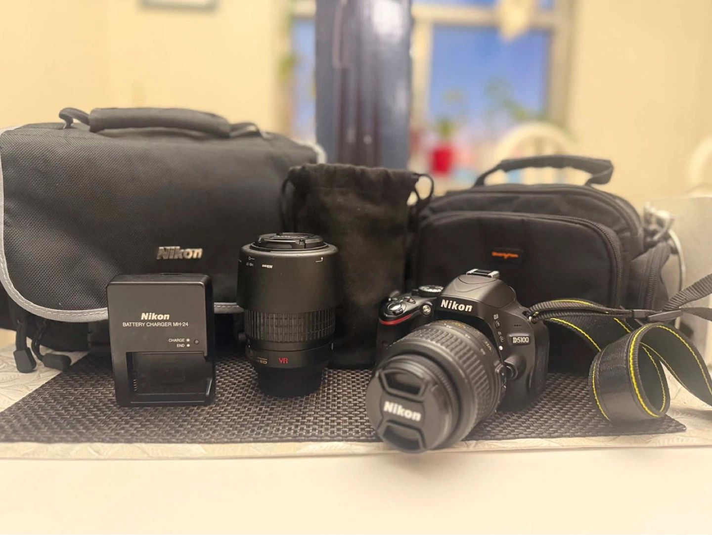 Nikon D5100 DSLR Camera with 18-55mm Lens and Accessories