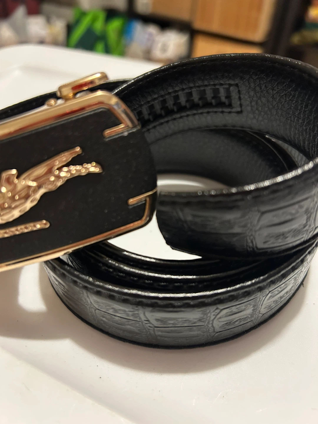 Black Belt with Gold Buckle and Alligator Design