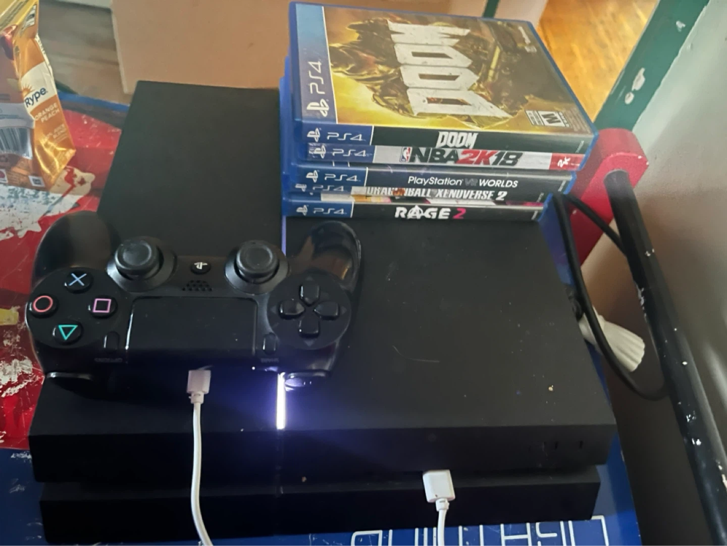 PlayStation 4 Console with 4 Games and Controller