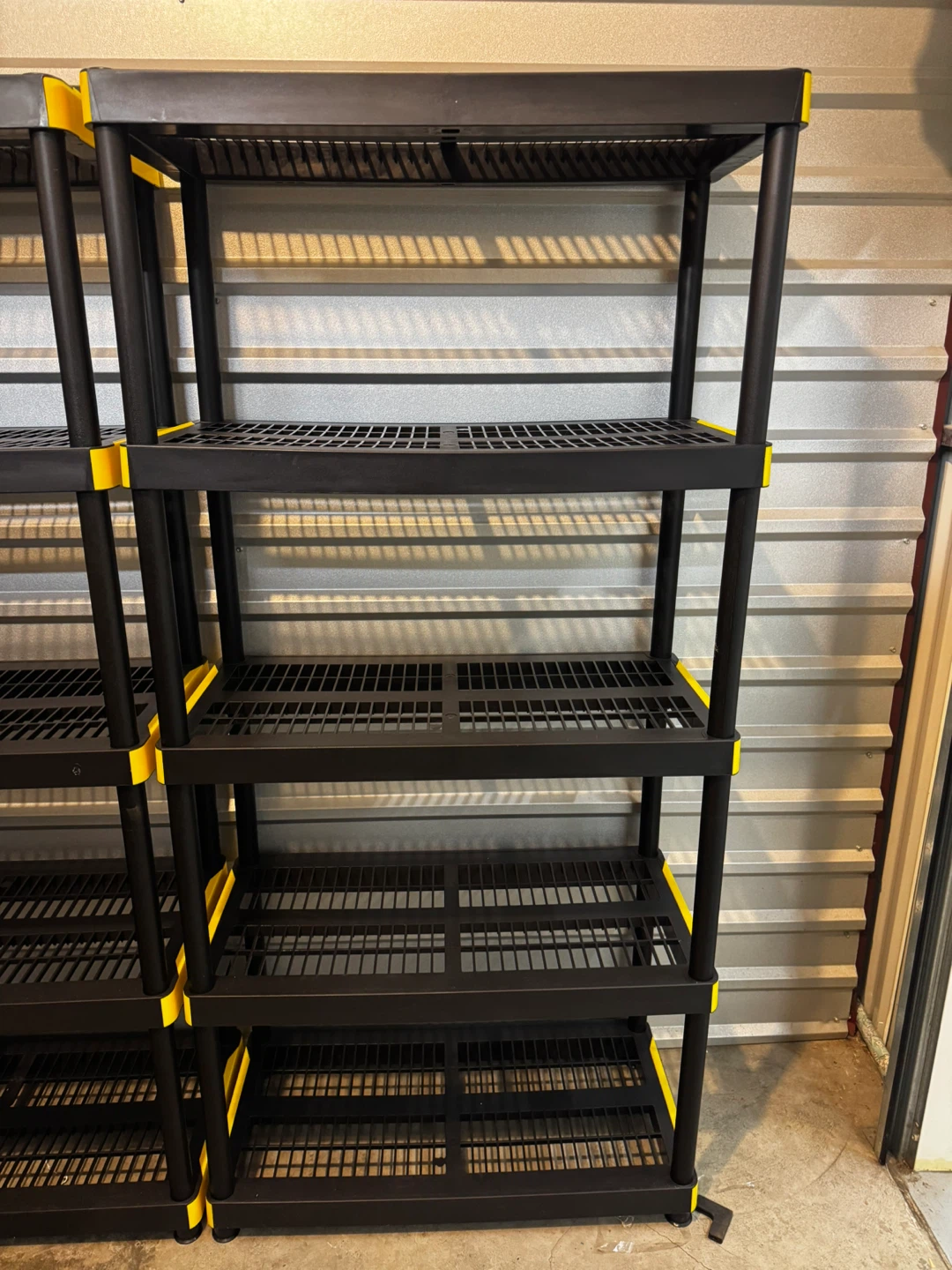 Black 5-Tier Plastic Shelving Unit with Yellow Accents