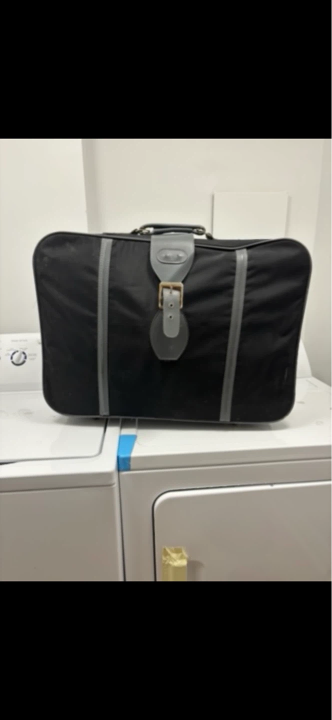 Black Rolling Suitcase in good condition