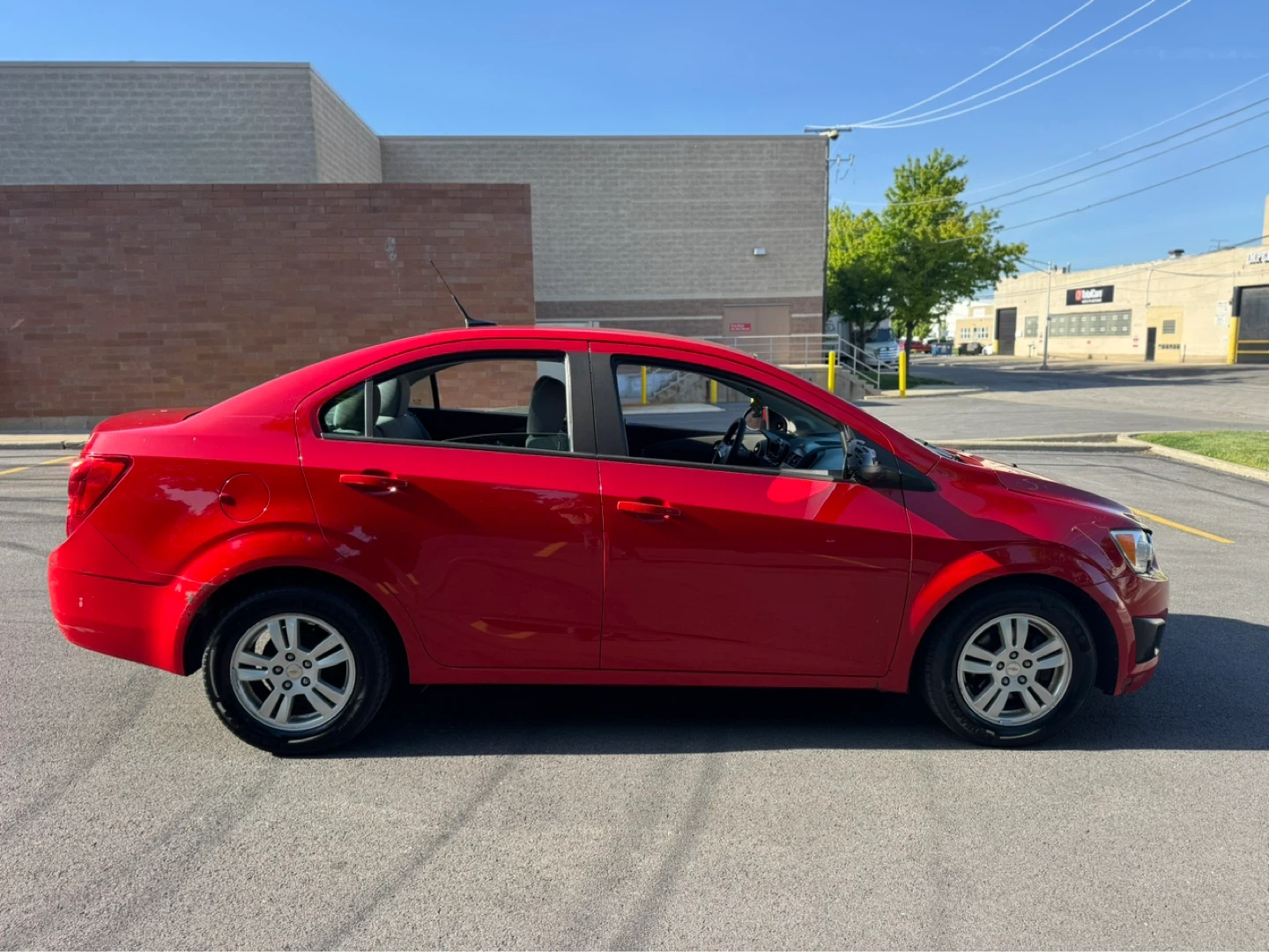 Red Chevrolet Sonic Sedan - photo 2