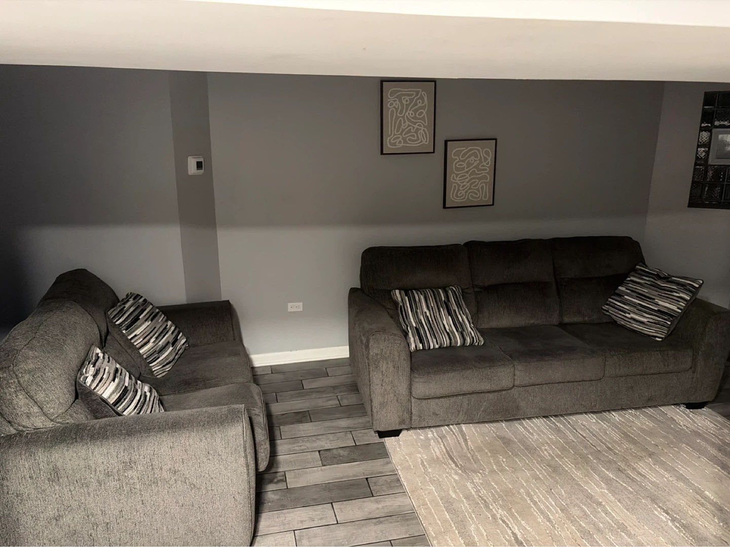 Dark Gray Sectional Sofa with Accent Pillows