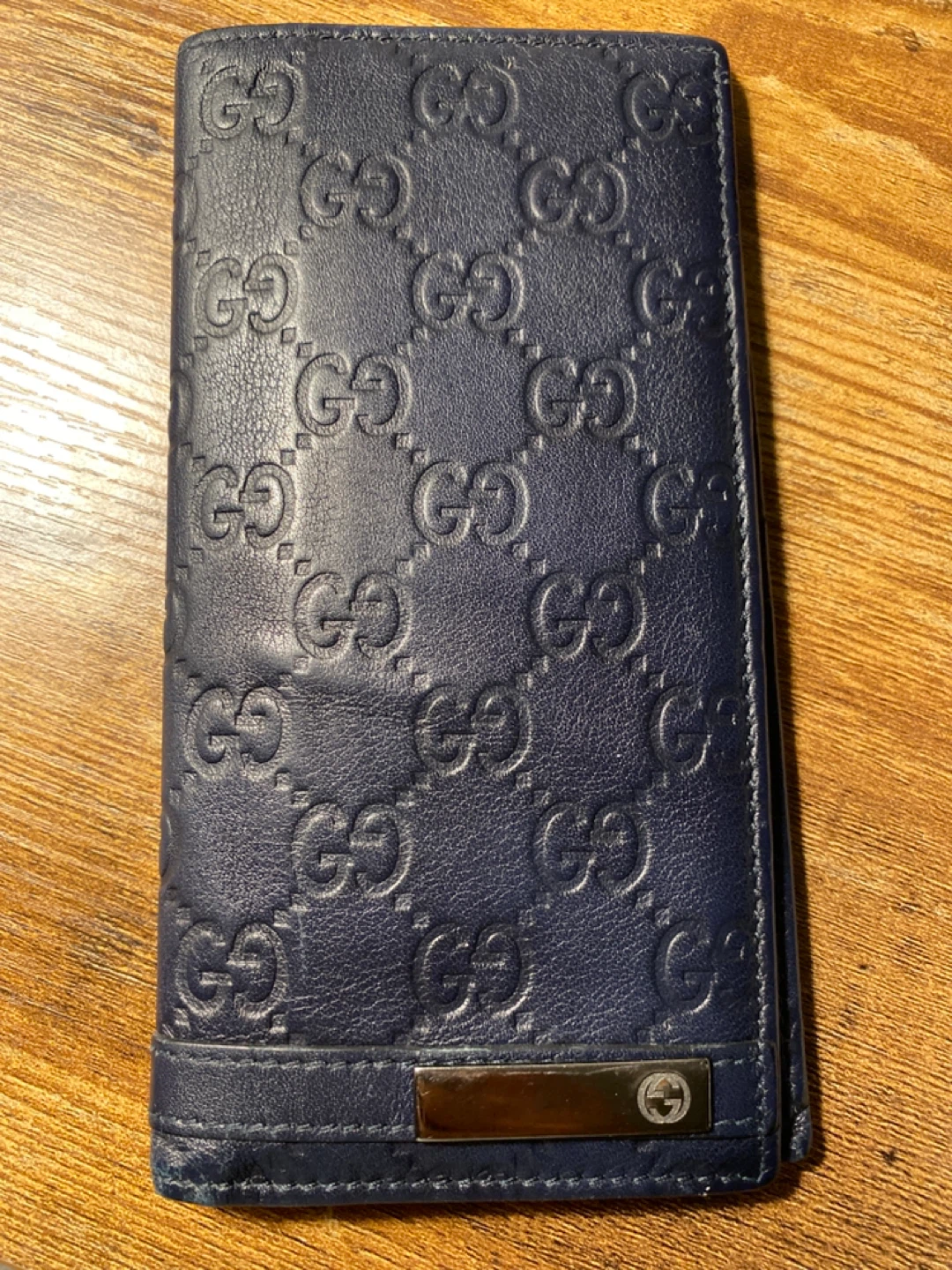 Gucci Gg Embossed Leather Bi-Fold Wallet