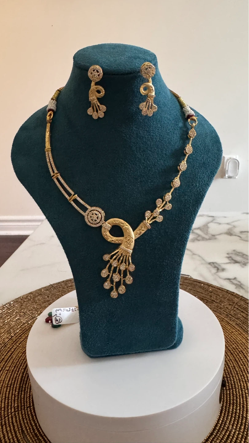 Gold and Diamond Necklace and Earrings Set