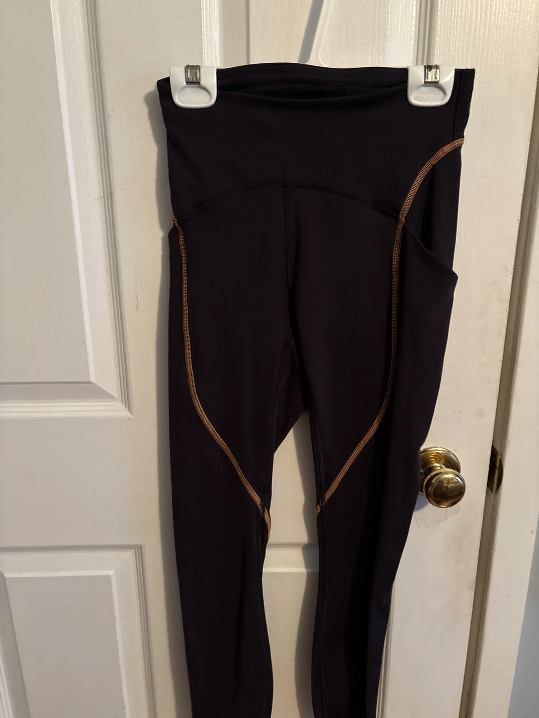 Lululemon black and orange leggings size 4 tight 25 pockets