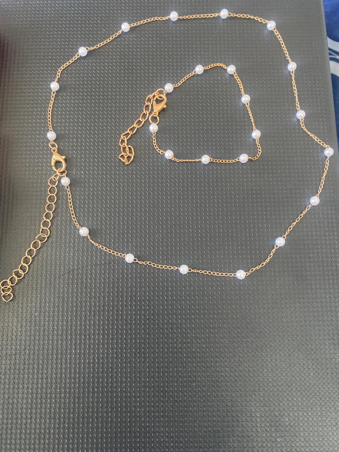 Gold-tone necklace and bracelet with faux pearls