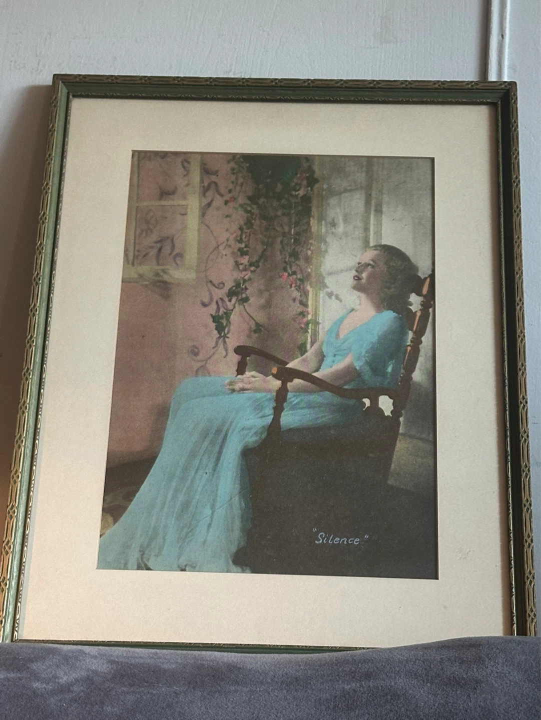 Antique Portrait of a blonde woman titled “ silence”