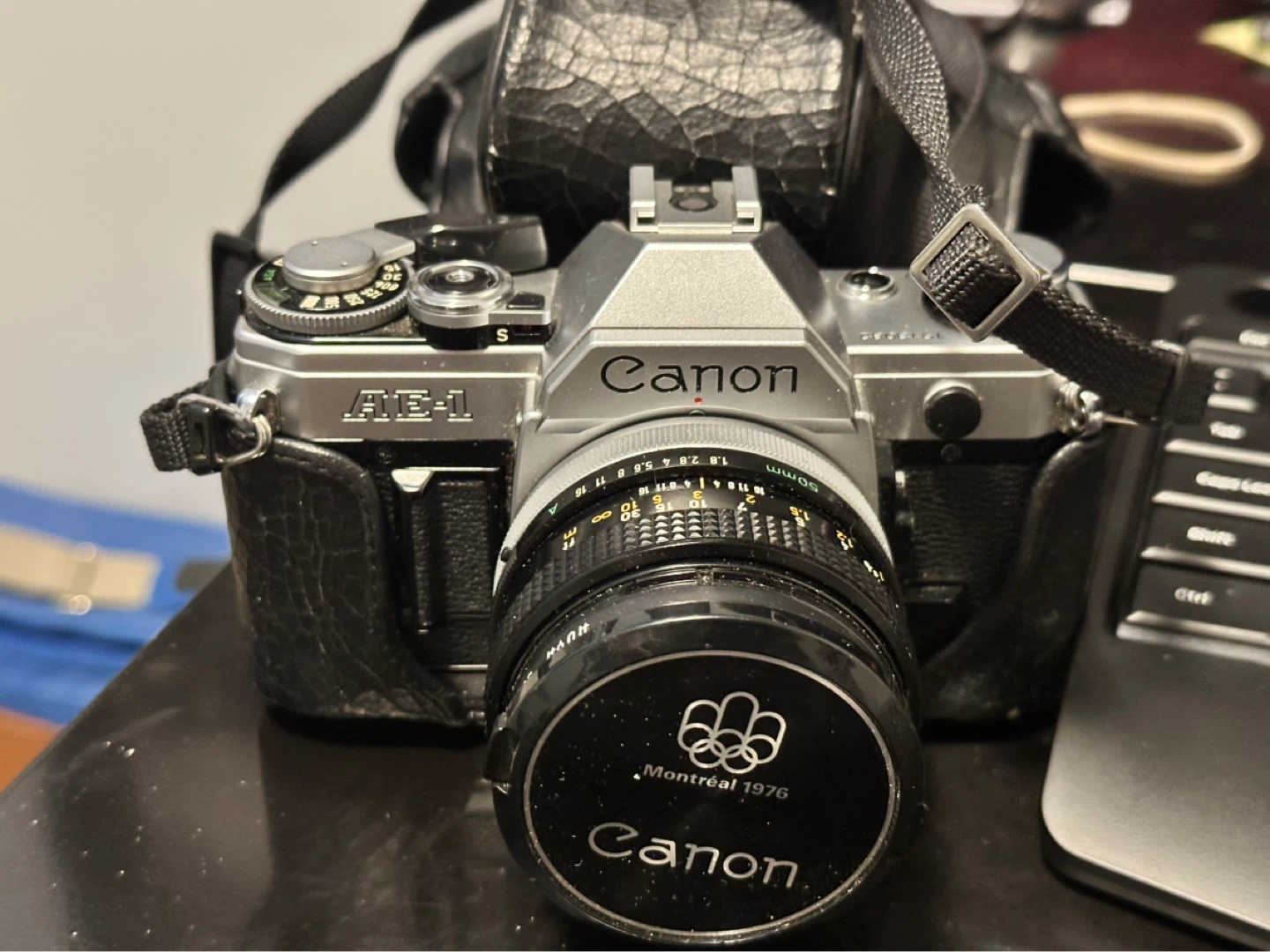Canon AE-1 Film Camera with 1976 Montreal Olympics Lens Cap