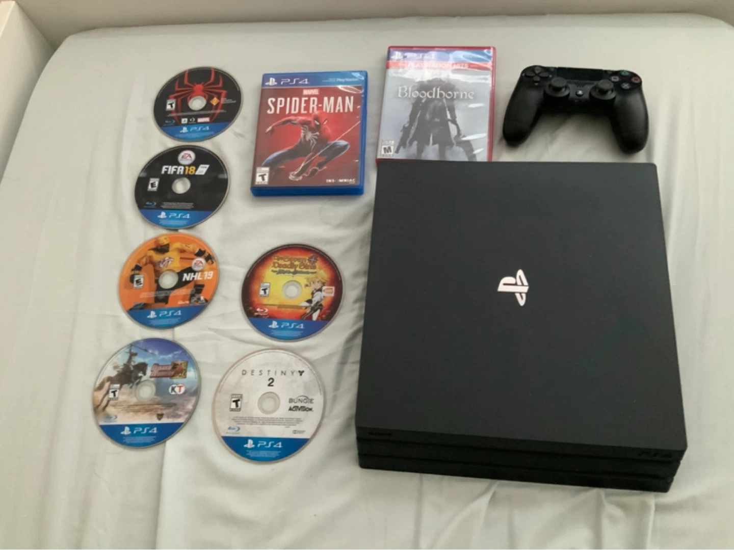 PlayStation 4 PRO 1TB Console with 8 Games & Controller