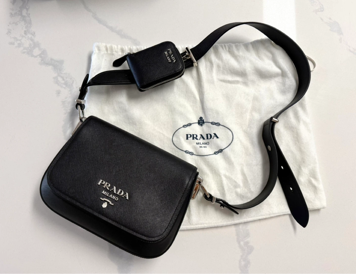 Prada Vitello Daino leather Saddle bag.