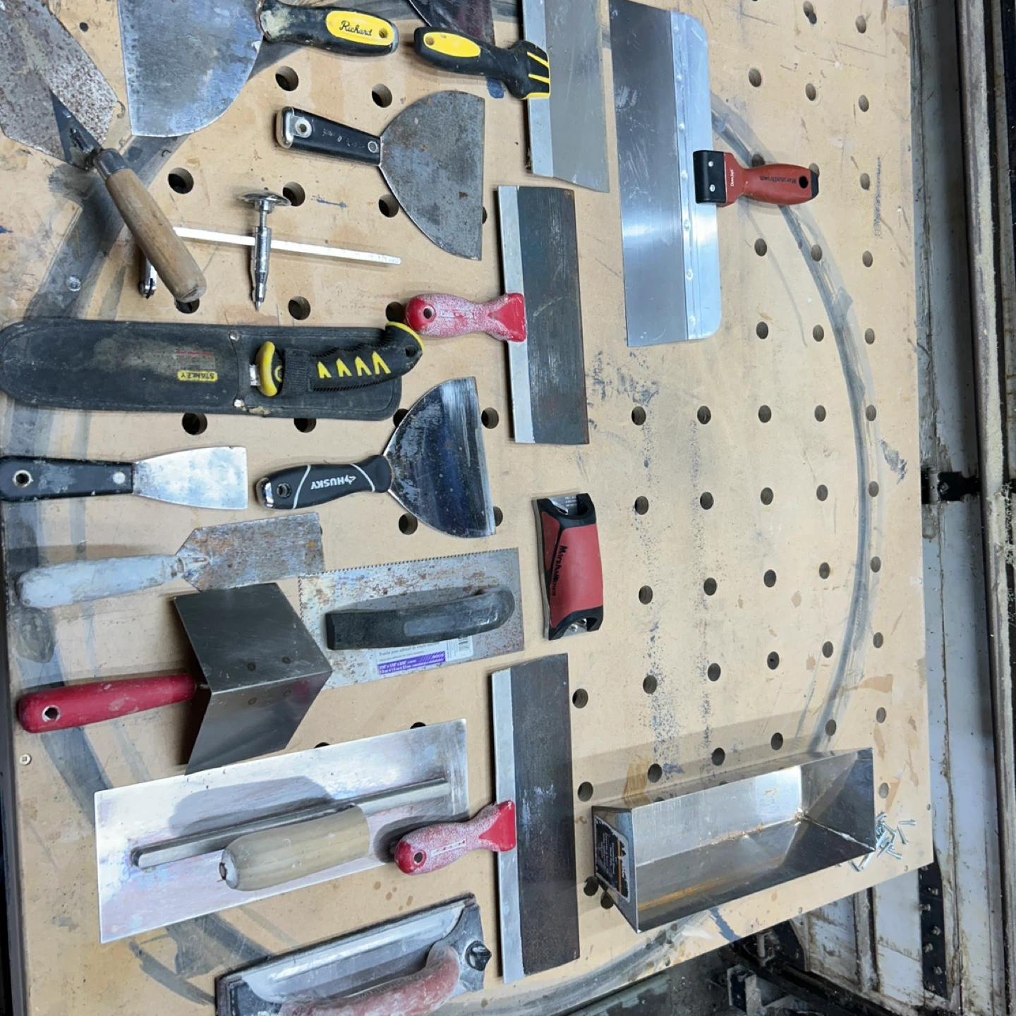 Assorted Drywall Trowels and Tools