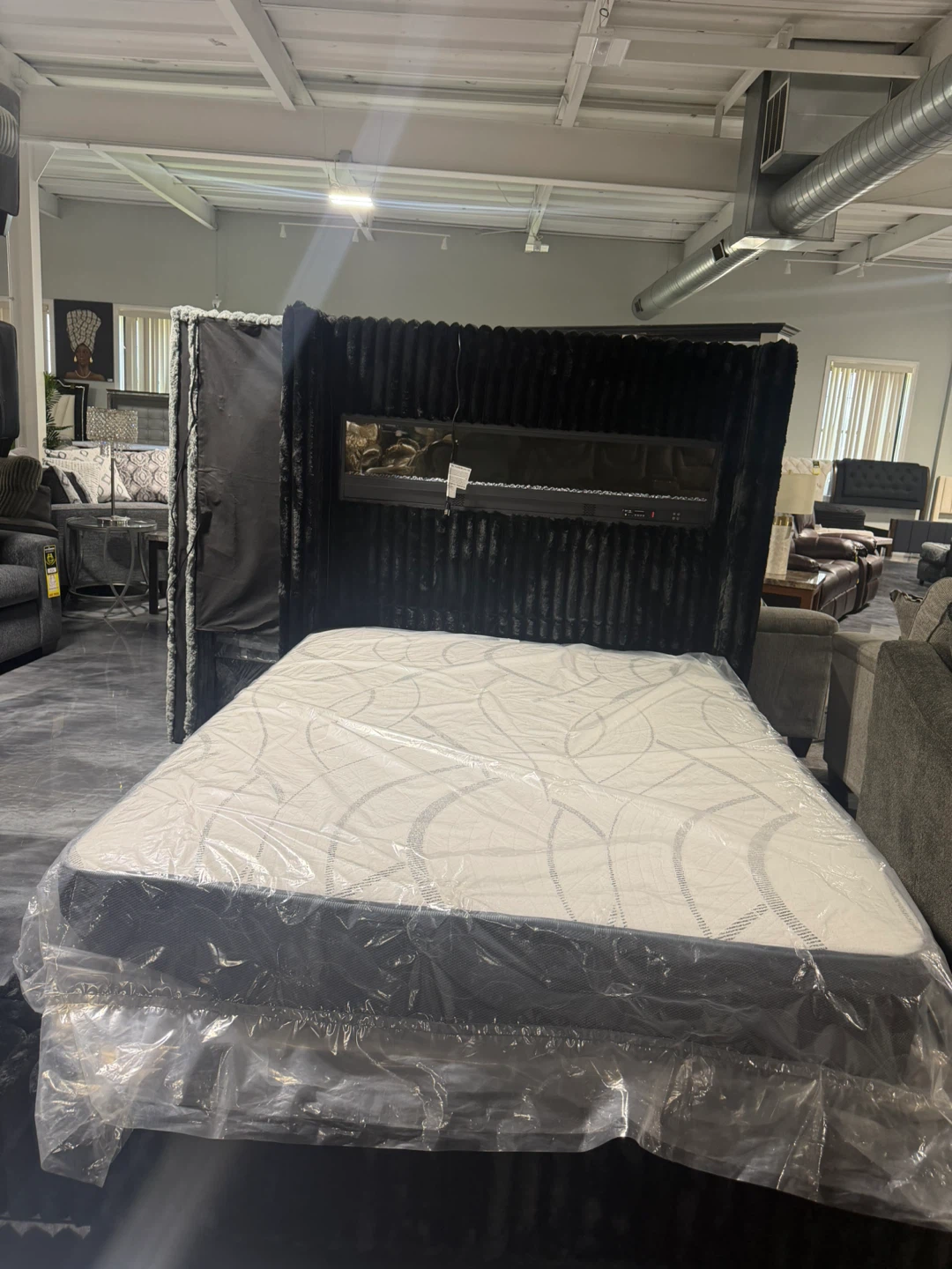 Black Faux Fur Headboard with Integrated Fireplace and Mattress