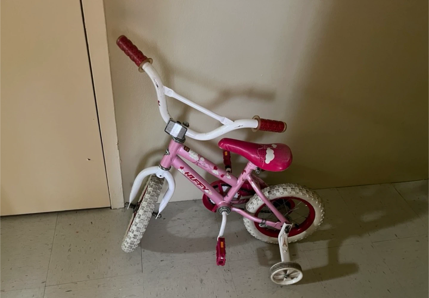 Pink Huffy Kids Bicycle with Training Wheels