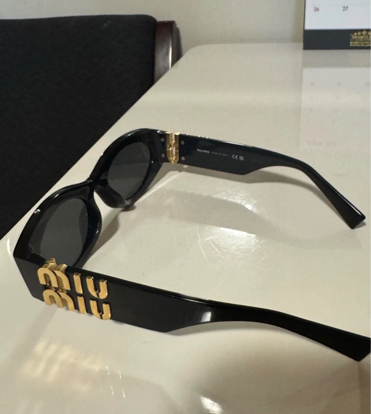 Miu Miu Sunglasses Black with Gold Embellishments - photo 4