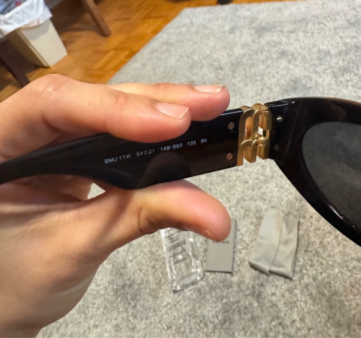 Miu Miu Sunglasses Black with Gold Embellishments - photo 3