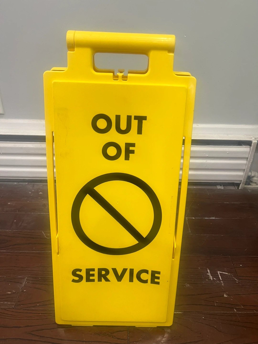 Yellow 'Out of Service' Caution Sign