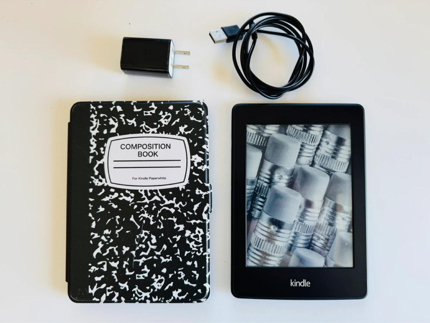 Amazon Kindle Paperwhite E-reader with Charger and Case