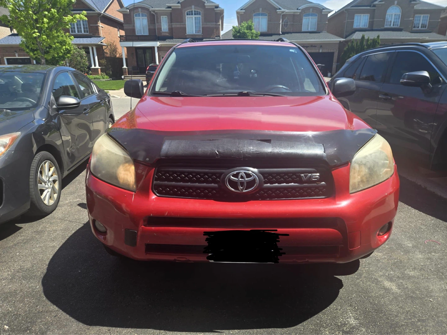 Red Toyota RAV4 AWD