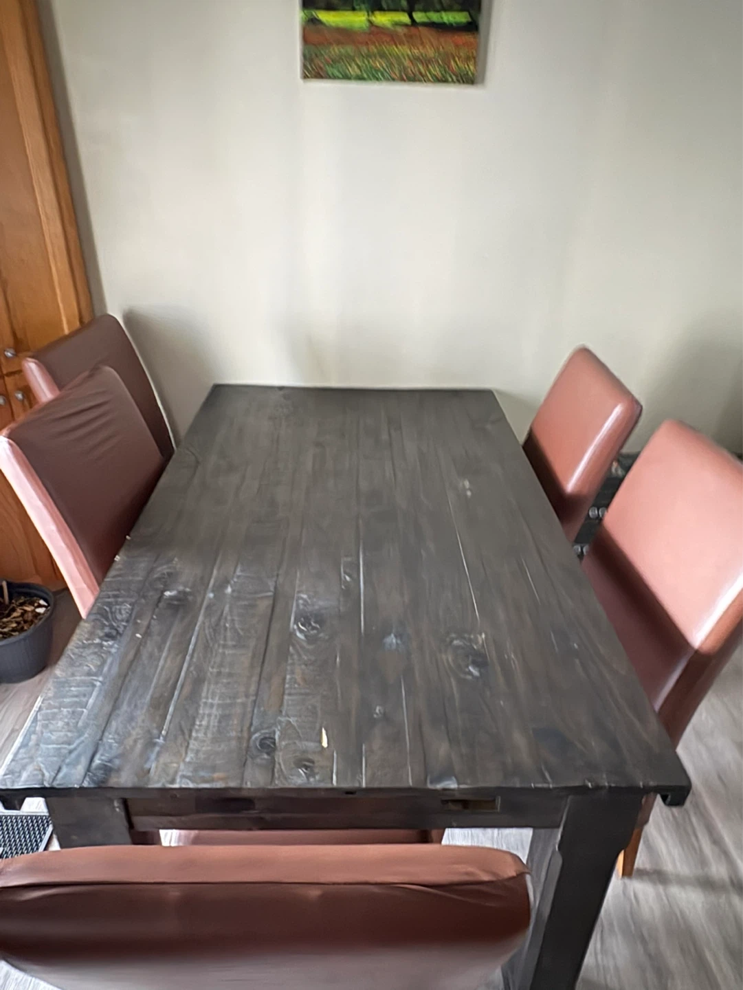 Wooden Dining Table with Brown Chairs
