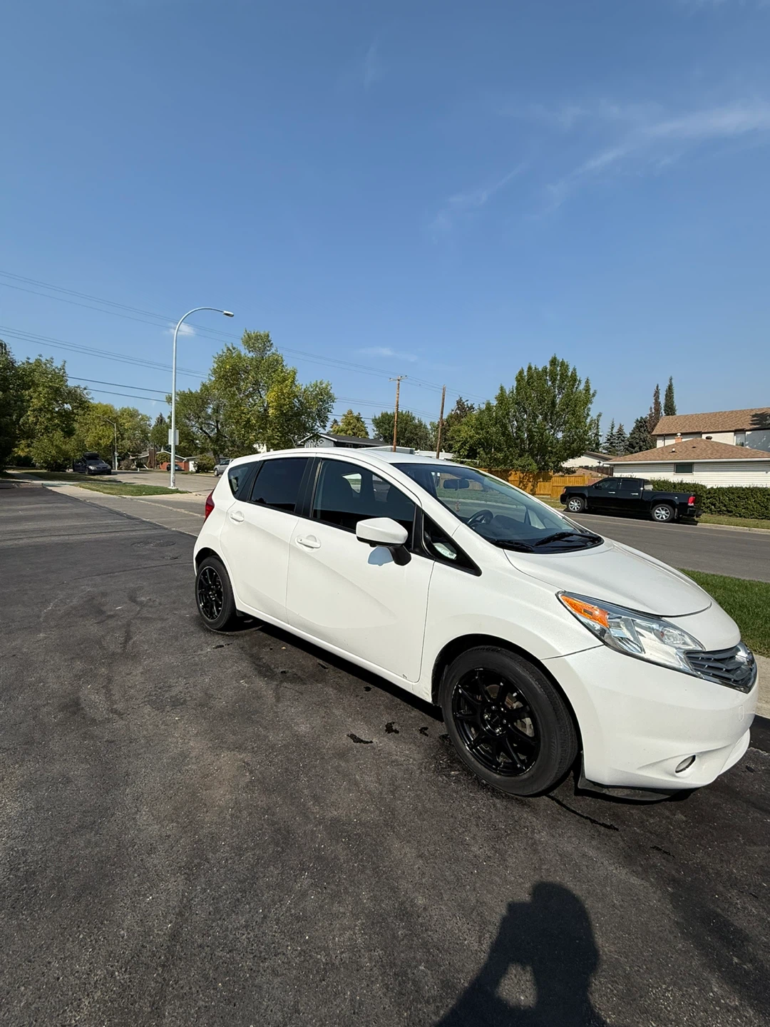 White Nissan Versa Hatchback