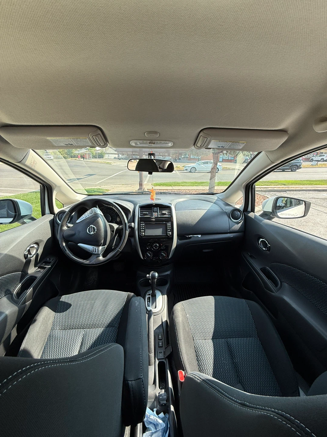 White Nissan Versa Hatchback - photo 2