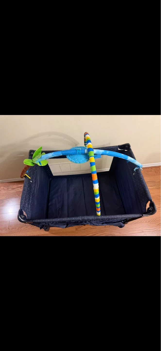 Play/Sleep Playard with Multi-level and Toy Bar - photo 5