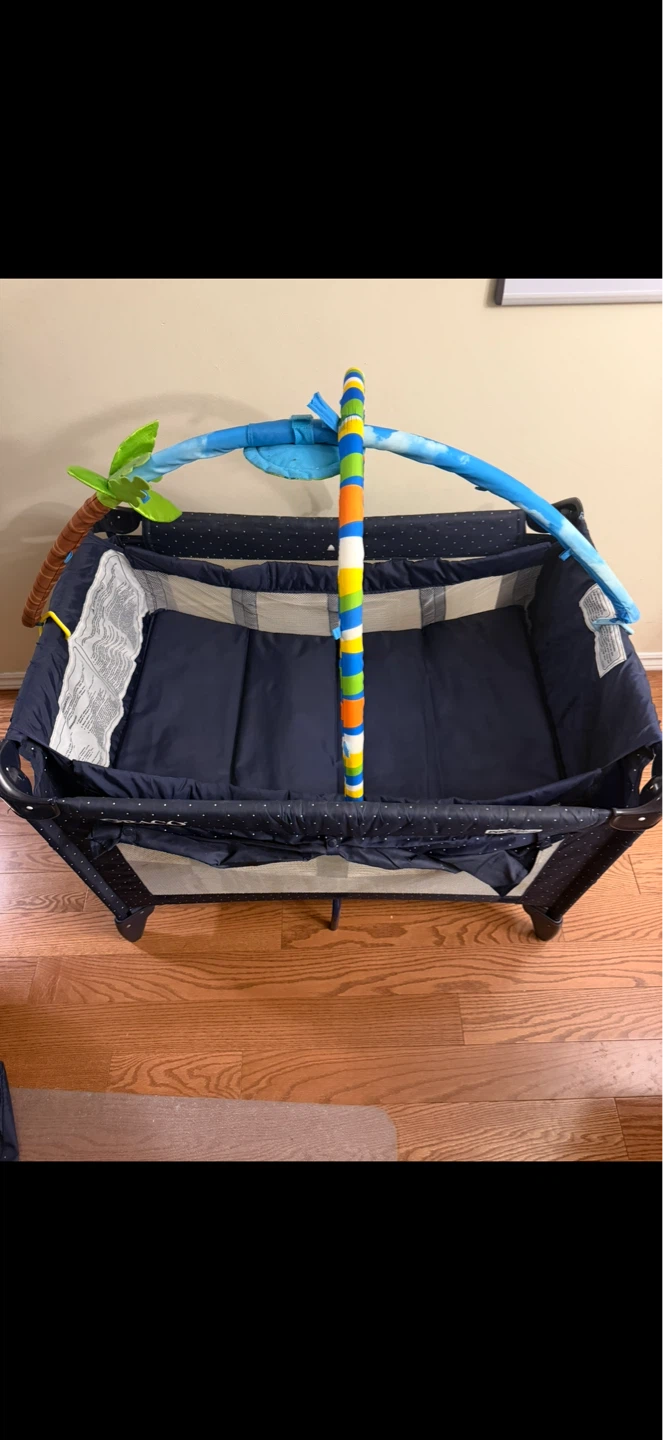 Sleep/Play Playard with Multi-floor and Toy Bar - photo 3