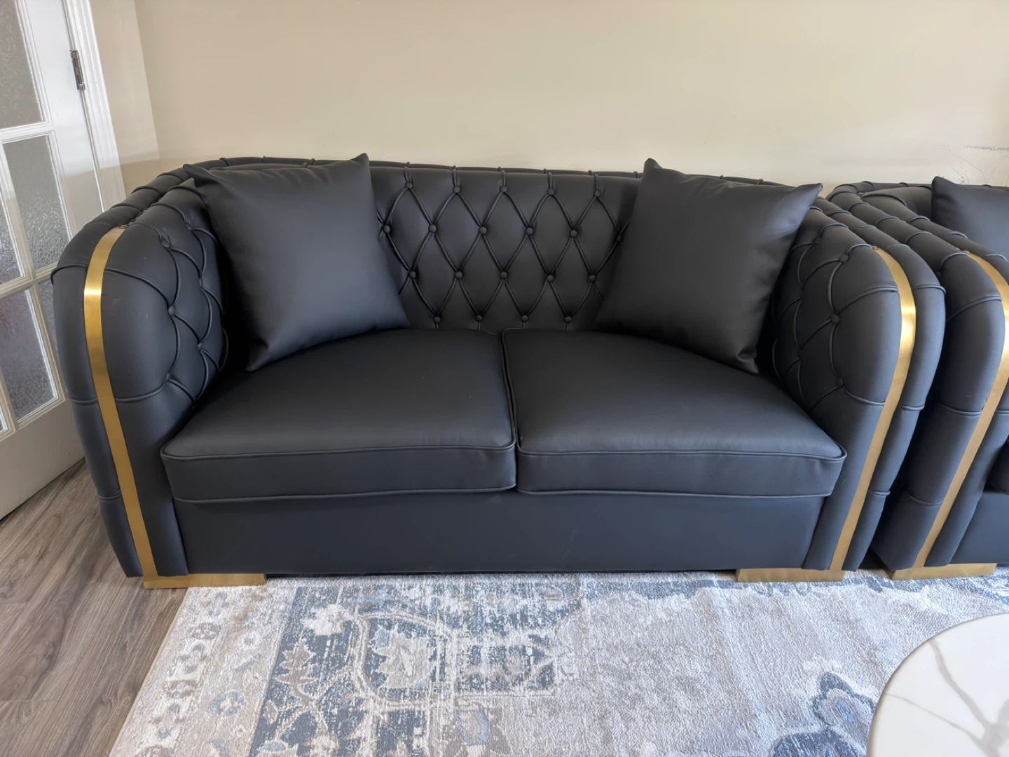 Black Tufted Sofa with Gold Accents - photo 3