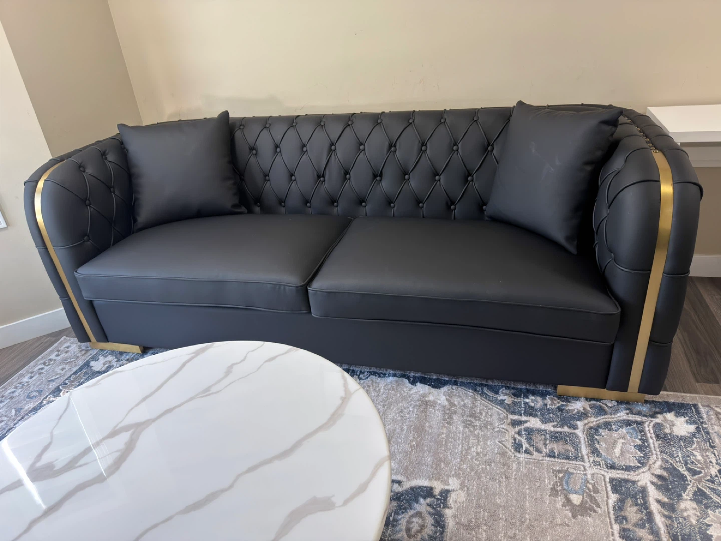 Black Tufted Sofa with Gold Accents - photo 4