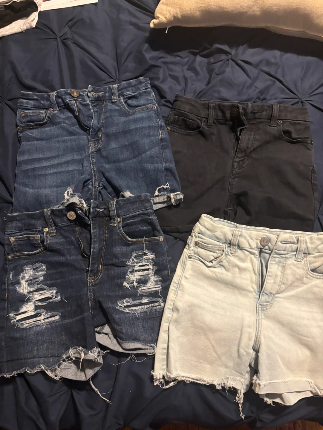 Four pairs of denim shorts for girls