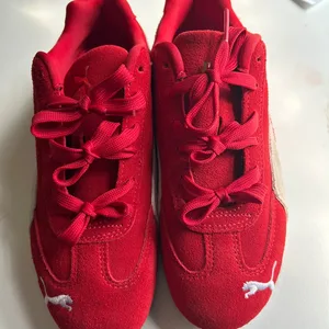 Puma Red Suede Low Top Sneakers