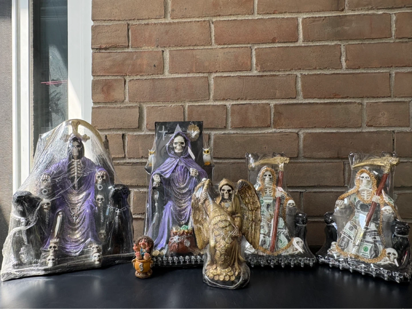 Collection of Santa Muerte Statues - photo 2