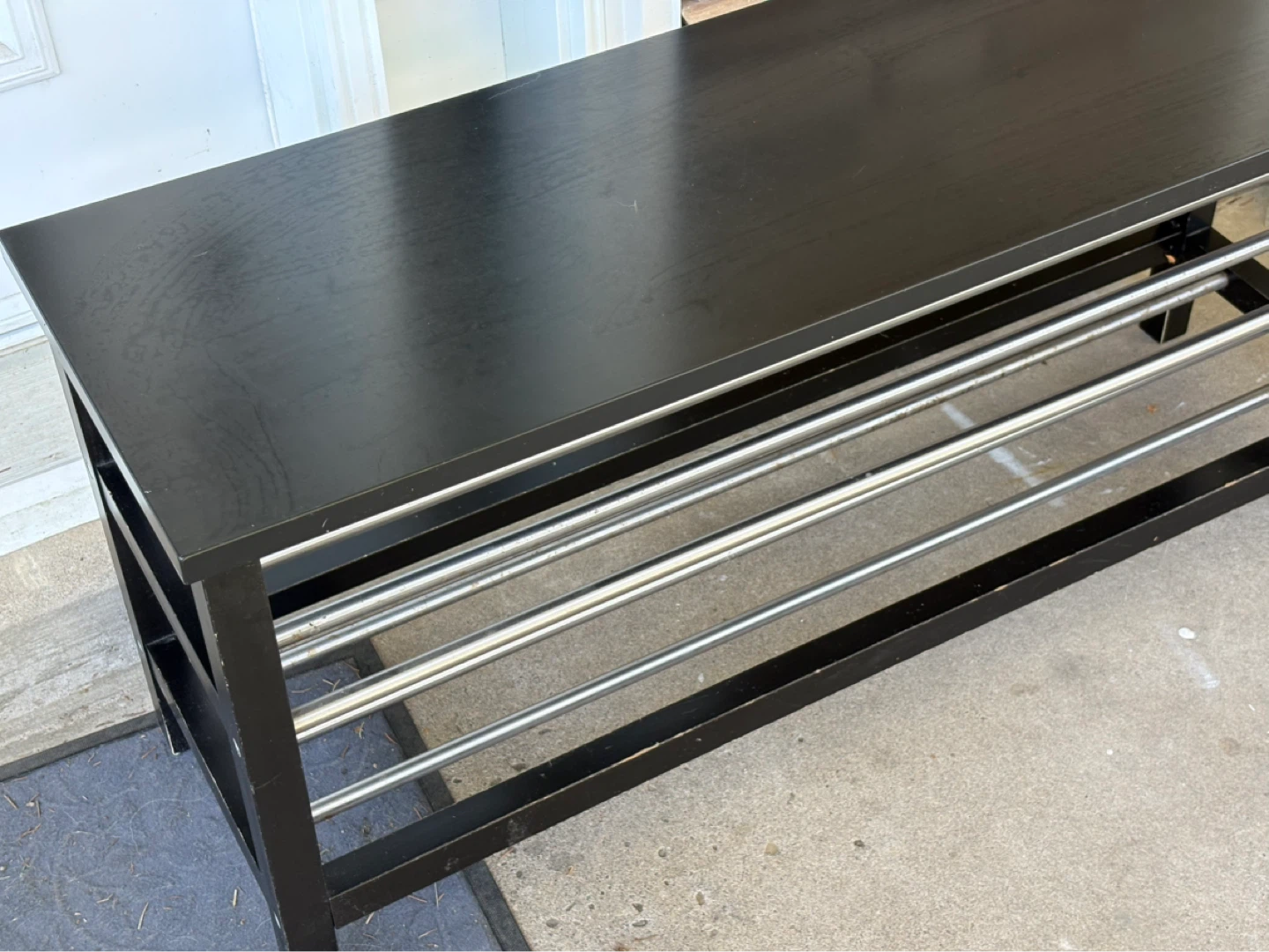 Black entryway bench with shoe rack