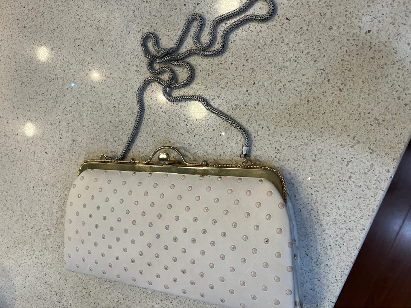 White beaded clutch purse with silver chain