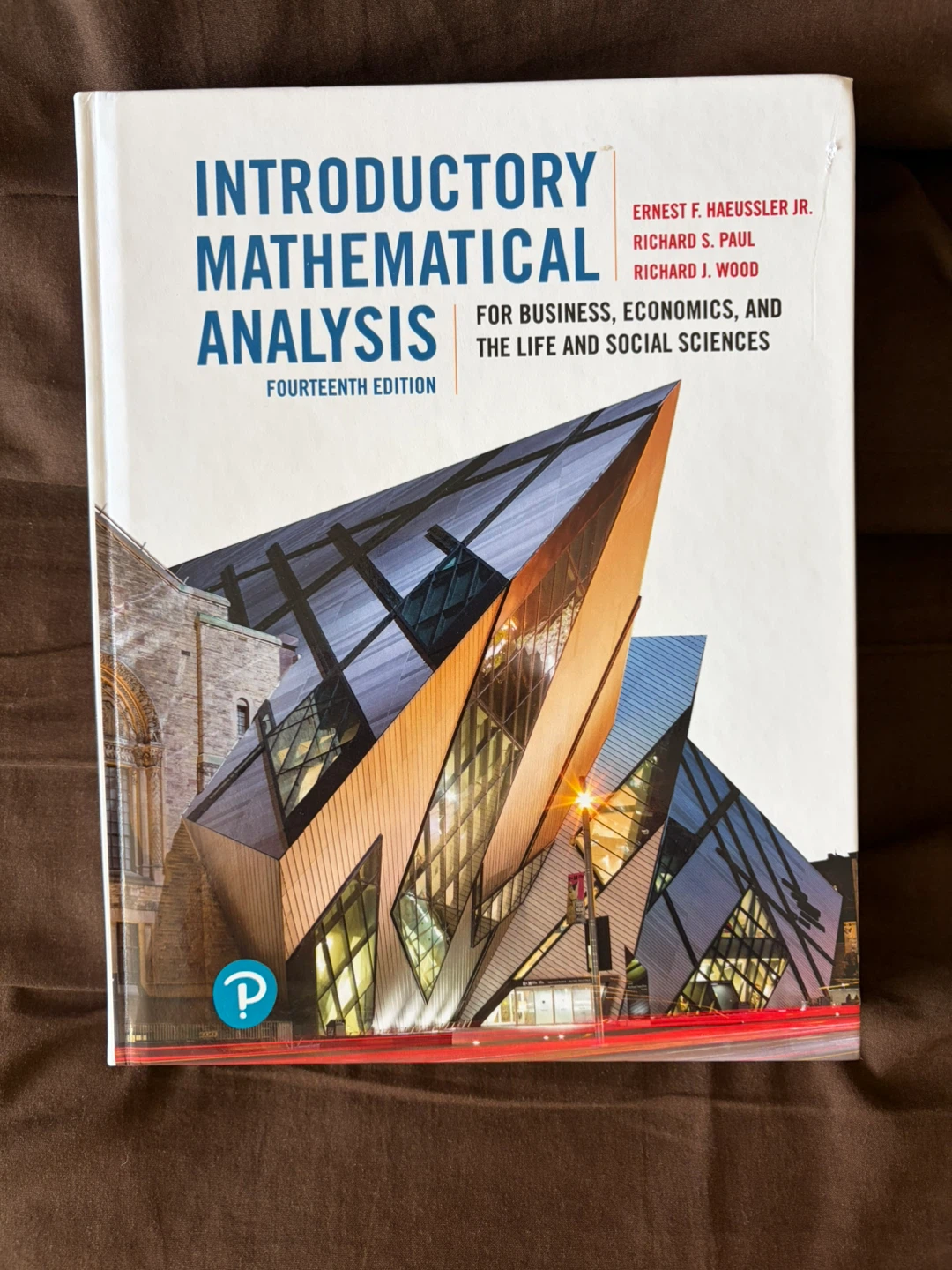 Introductory Mathematical Analysis Fourteenth Edition Textbook
