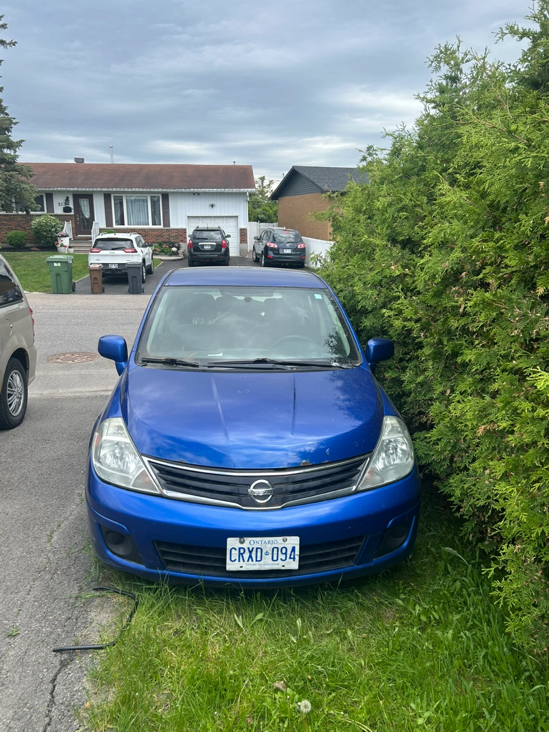 Blue Nissan Versa Hatchback - photo 3