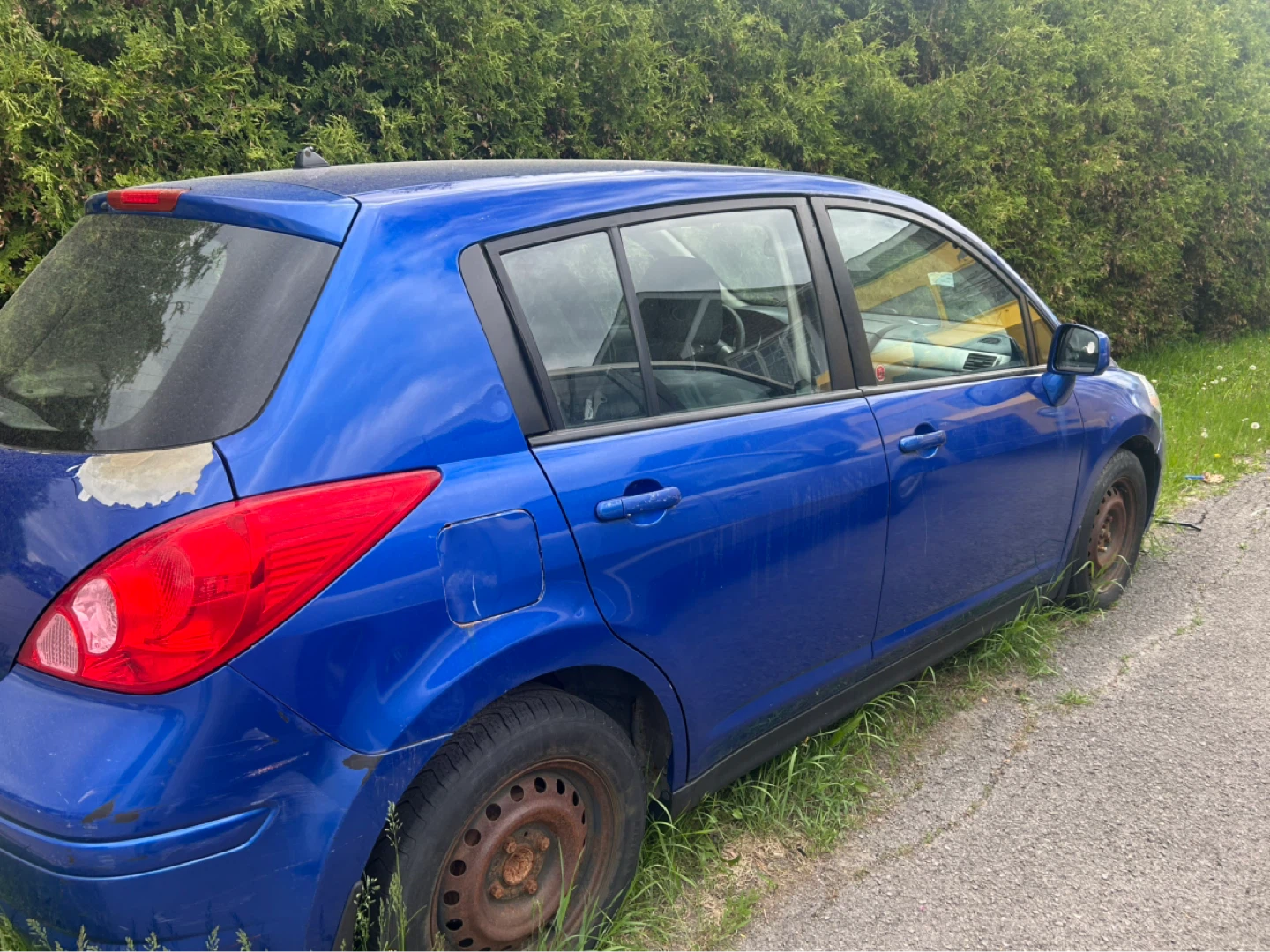 Blue Nissan Versa Hatchback - photo 5