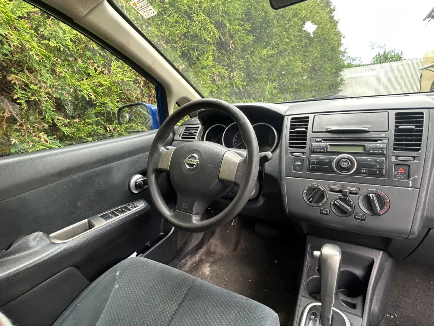 Blue Nissan Versa Hatchback