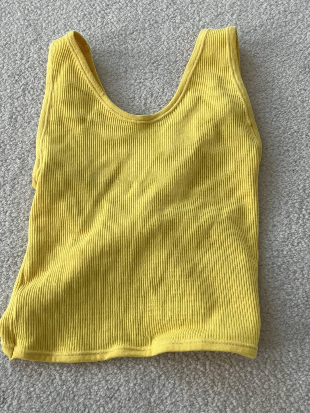 Urban Outfitters: cropped yellow ribbed tank top