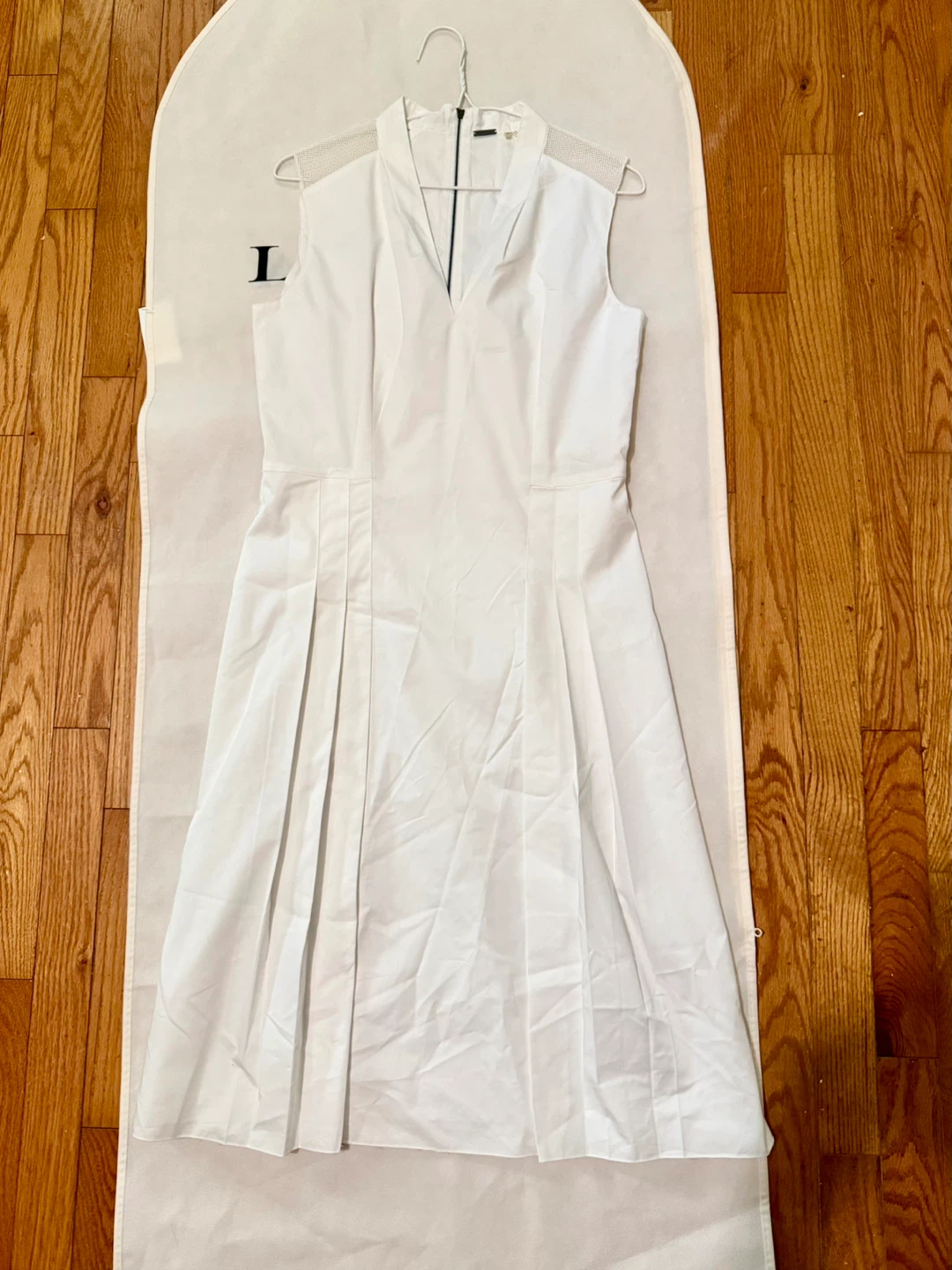 White Sleeveless V-Neck Dress
