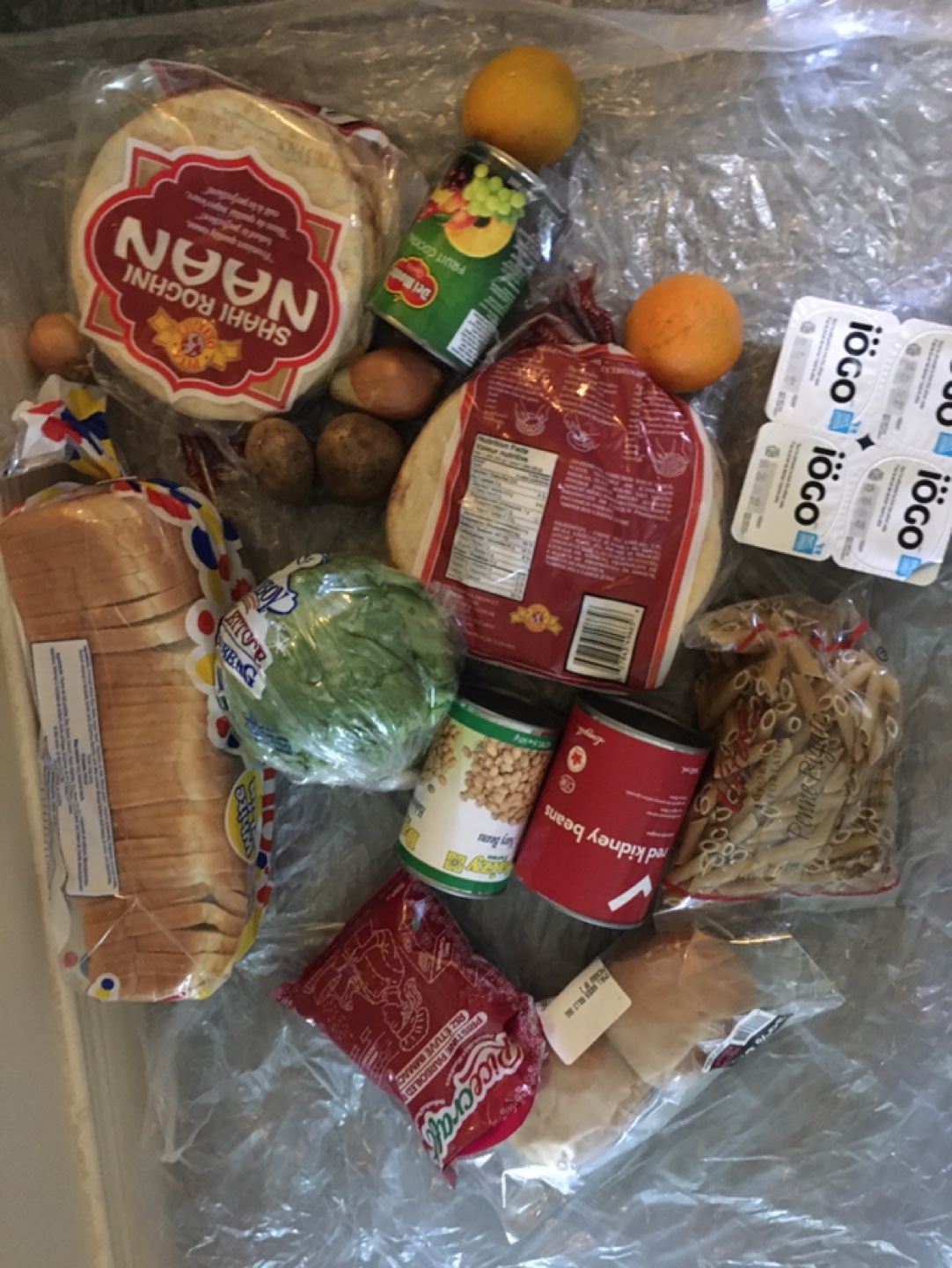 Assorted Groceries: Naan, Bread, Yogurt, Pasta & Canned Goods