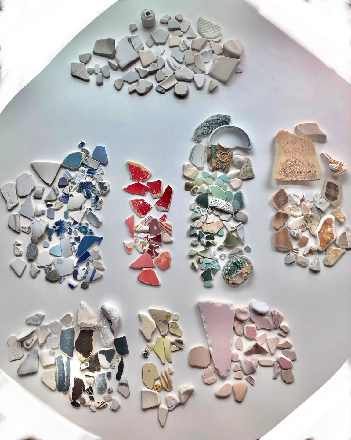 Assorted ceramic and glass shards $10 per colour lot