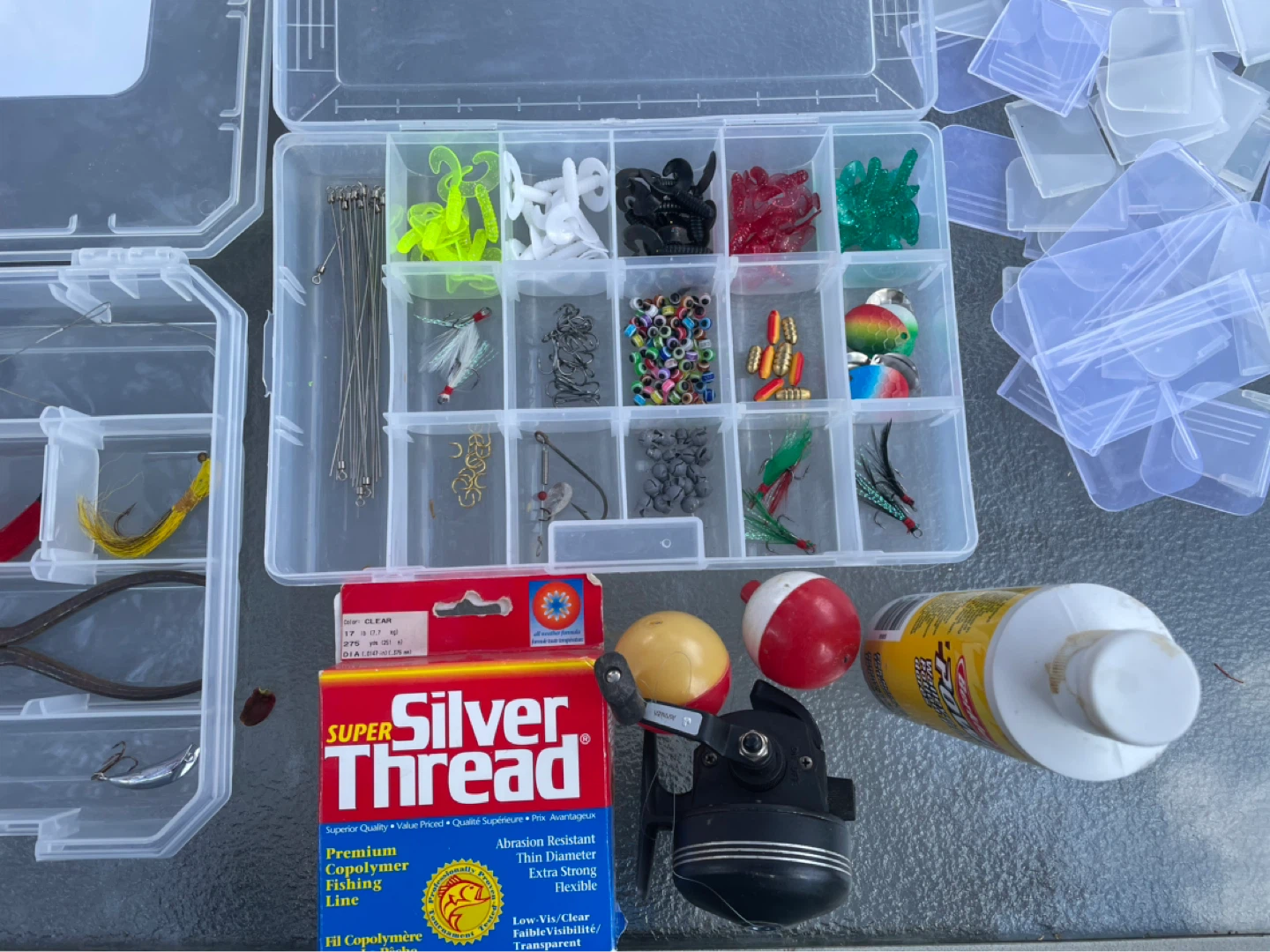 Fishing Tackle Box with Assorted Lures, Hooks, and Line - photo 4
