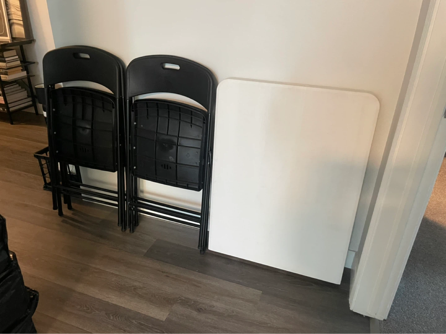 Set of 4 Black Folding Chairs and 1 White Folding Table