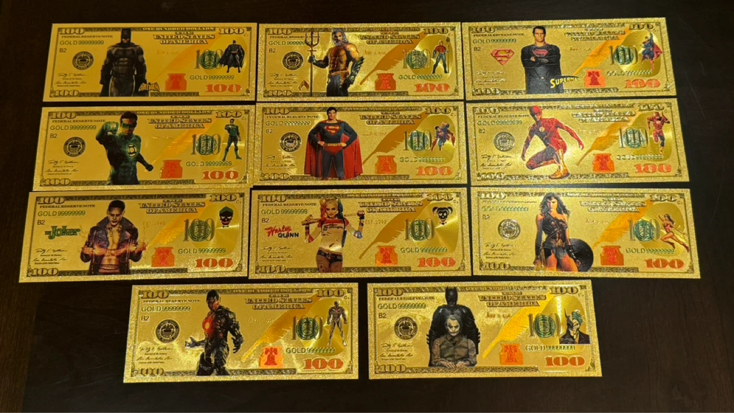Collection of 11 Superhero Gold Foil Dollar Bills