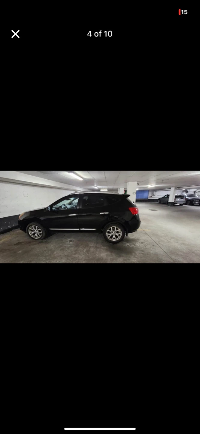 Black Nissan Rogue SUV - photo 4