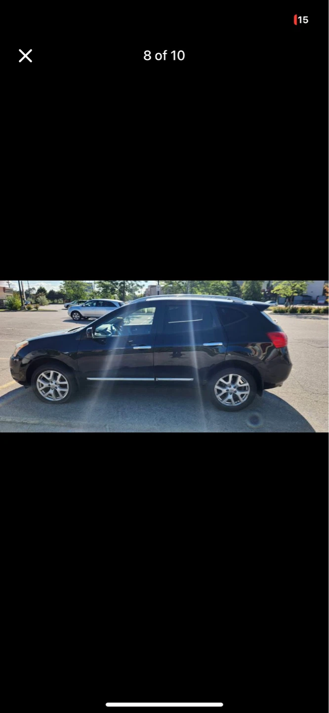 Black Nissan Rogue SUV - photo 3